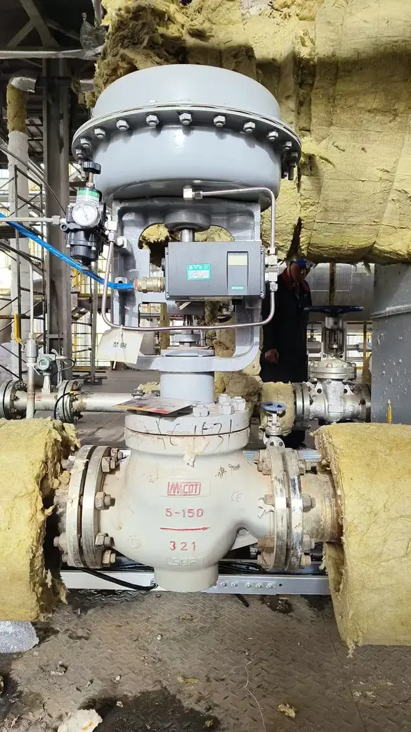Pneumatic globe control valve on insulated process piping