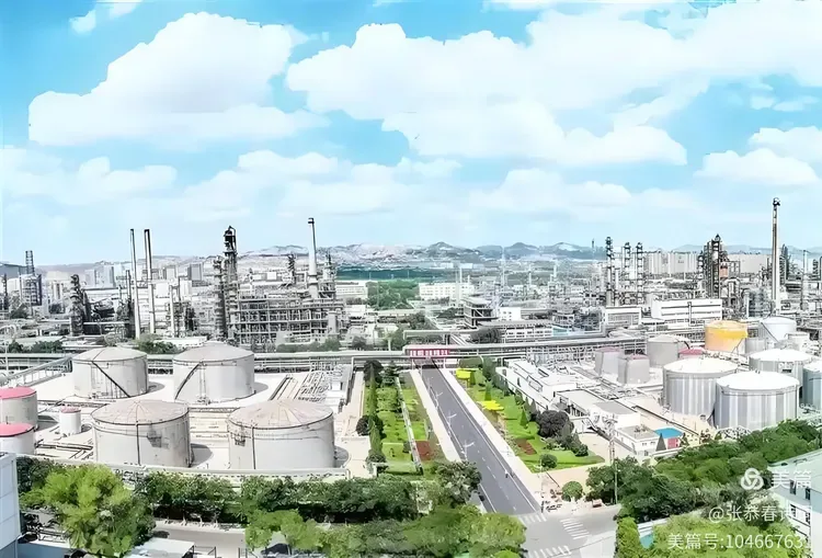 Aerial view of process units, storage tanks and pipework across a large industrial site